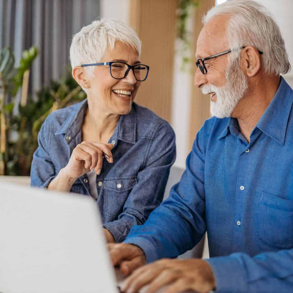 Gonzales Precious Metals IRA & Investing Company Copy of Senior couple at laptop smiling GettyImages 1323096524 1200x1200 1